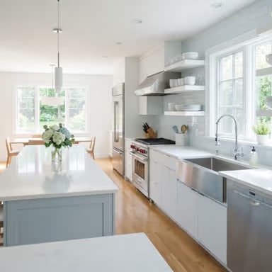 A spotless kitchen with clear, polished countertops